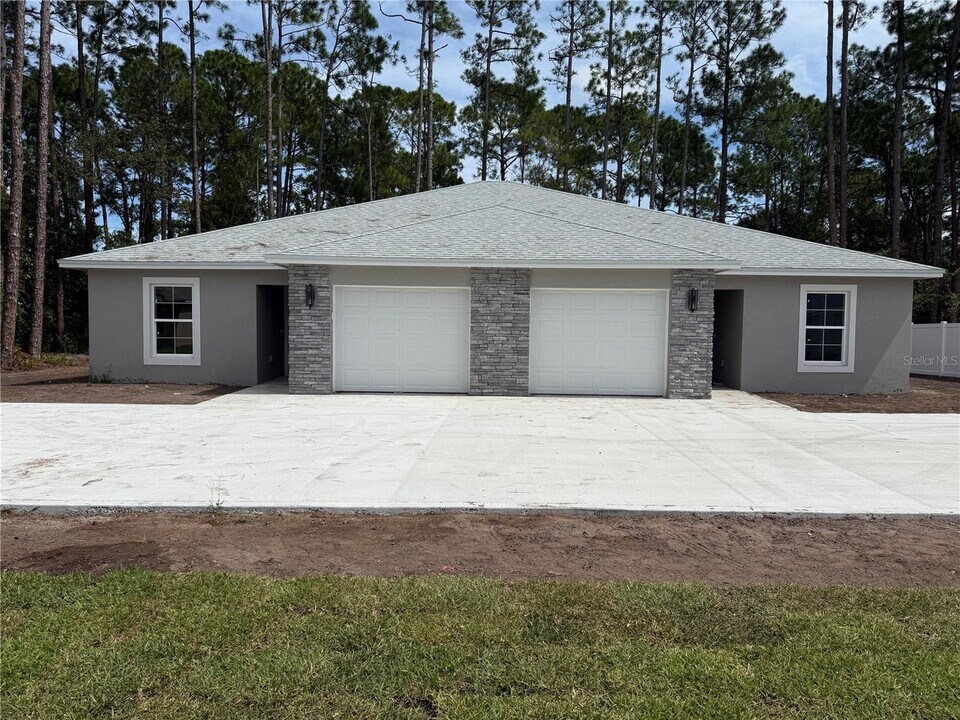 59 Wellstream Ln, Unit #A in Palm Coast, FL - Foto de edificio