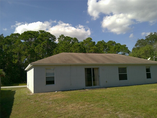 865 Helm Ave in Palm Bay, FL - Building Photo - Building Photo