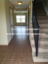 411 S Darrowby Dr in Raymore, MO - Building Photo - Building Photo