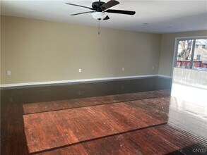 7650 Commodore Cir in Liverpool, NY - Building Photo - Building Photo