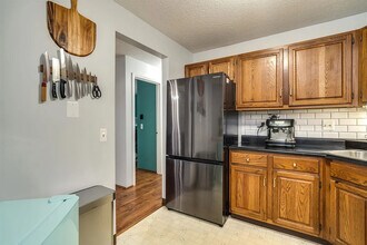 14 Flintlock Ln, Unit 1 in Merrimack, NH - Foto de edificio - Building Photo