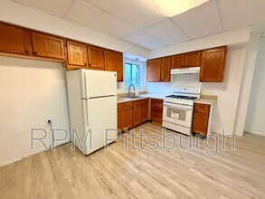 1108 Oswin St in Pittsburgh, PA - Building Photo - Building Photo
