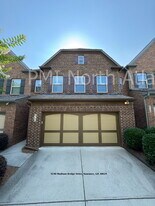 4140 Madison Bridge Dr in Suwanee, GA - Building Photo