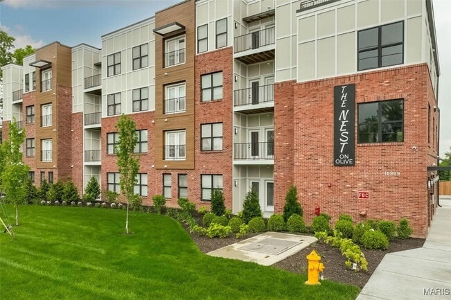 property at 10809 Olive Blvd