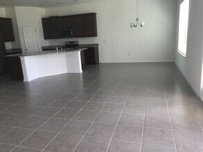 12808 Westside Vlg Lp in Windermere, FL - Building Photo - Building Photo