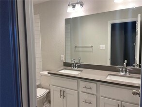 790 Eves Necklace Dr. in Mustang Ridge, TX - Building Photo - Building Photo