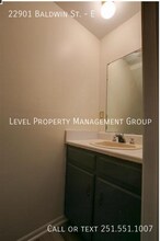 22901 Baldwin St-Unit -E in Robertsdale, AL - Building Photo - Building Photo