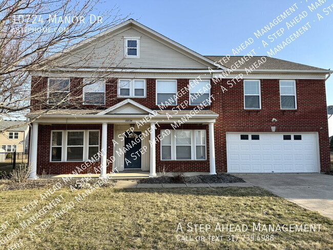 property at 10724 Manor Dr