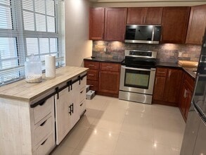 3520 Oaks Way, Unit 407 in Pompano Beach, FL - Building Photo - Building Photo