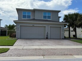 1201 NW Leonardo Cir in Port St. Lucie, FL - Building Photo