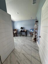 8680 Pavia St in Fort Pierce, FL - Building Photo - Building Photo