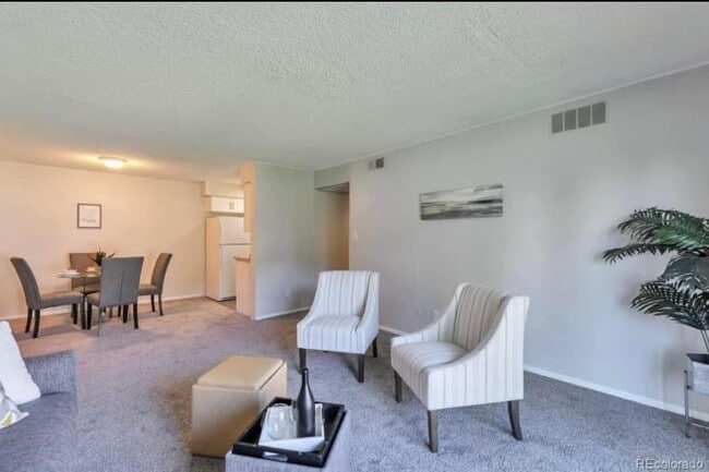 7755 E Quincy Ave, Unit #D4-203 in Denver, CO - Building Photo - Building Photo