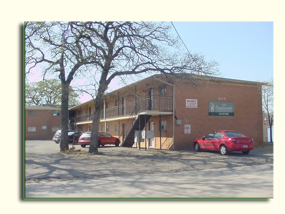 The Courtyards Apartments in Denton, TX - Building Photo