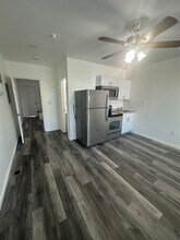 1209 N Caroline St, Unit 3 in Baltimore, MD - Foto de edificio - Building Photo