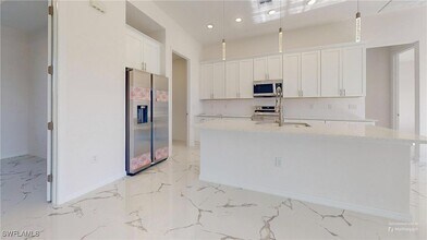2310 NW 26th Pl in Cape Coral, FL - Building Photo - Building Photo