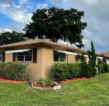 718 Whippoorwill Ln in Delray Beach, FL - Foto de edificio - Building Photo