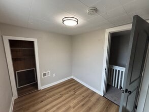 668 Sullivan St, Unit A in Elmira, NY - Foto de edificio - Building Photo