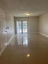 5001 Wiles Rd in Coconut Creek, FL - Building Photo - Building Photo