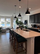 6140 Planta Ln in Greenacres, FL - Foto de edificio - Building Photo