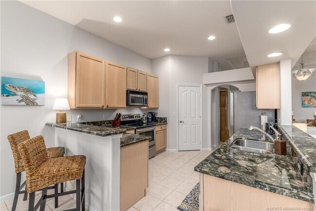 property at 4420 NW Royal Oak Dr