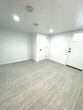 10517 101st Rd, Unit 1 in Ozone Park, NY - Foto de edificio - Building Photo