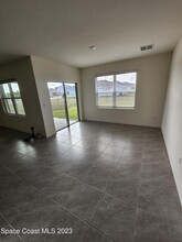 1242 McFarland Dr in West Melbourne, FL - Building Photo - Building Photo