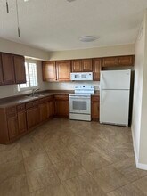 Poinciana Apartments in Naples, FL - Building Photo - Building Photo