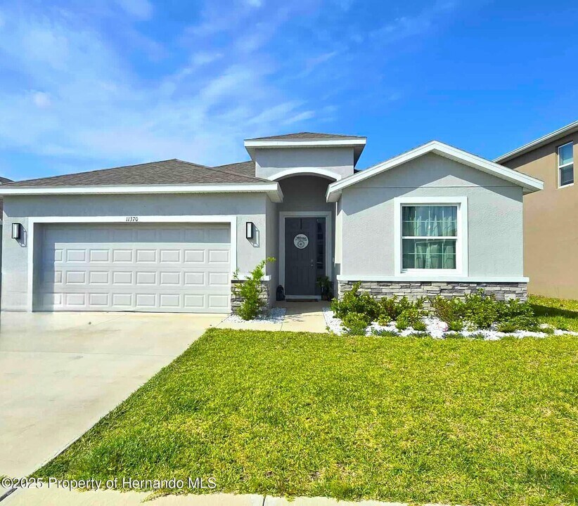 11370 Timber Grv Ln in Spring Hill, FL - Building Photo