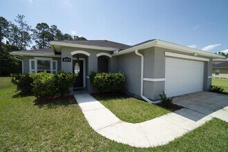 2557 Reagan Lakes Ln in Jacksonville, FL - Foto de edificio - Building Photo