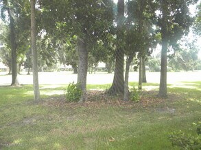 1003 Country Club Dr in Titusville, FL - Building Photo - Building Photo