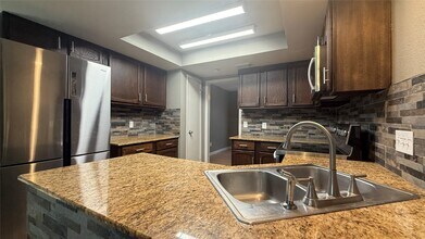 8110 Streamside Dr in Houston, TX - Building Photo - Building Photo