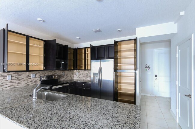 property at 10963 SW 233rd St