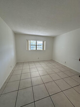 5031 W Oakland Park Blvd, Unit #105 in Lauderdale Lakes, FL - Building Photo - Building Photo