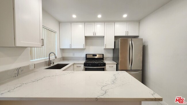property at 12942 Moorpark St