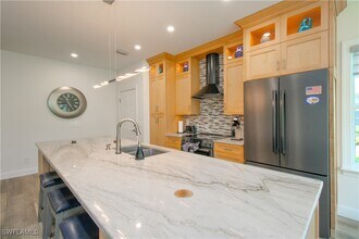 5632 Whisperwood Blvd in Naples, FL - Building Photo - Building Photo