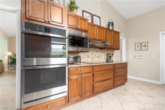 12813 NW Cinnamon Way in Palm City, FL - Building Photo - Building Photo