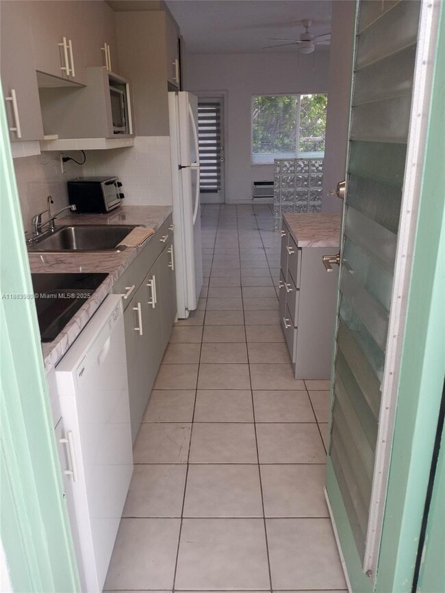 property at 6490 Collins Ave