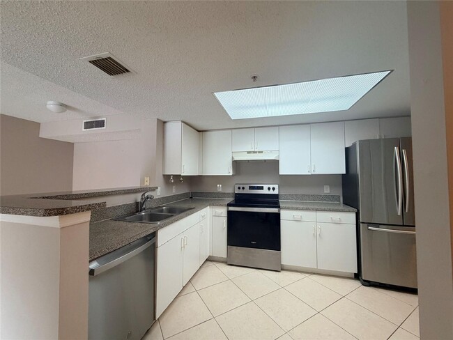 5025 Wiles Rd in Coconut Creek, FL - Building Photo - Building Photo