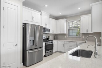 15219 Tolmino St in Naples, FL - Building Photo - Building Photo