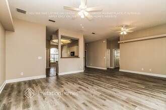 10428 Calle De Flores Dr in Clermont, FL - Foto de edificio - Building Photo