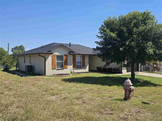 property at 6611 NW Ferris Ave