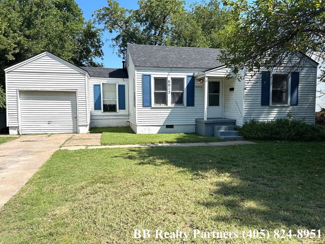 property at 6913 E 5th St