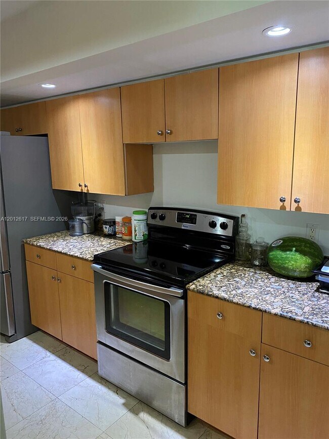 property at 6917 Collins Ave