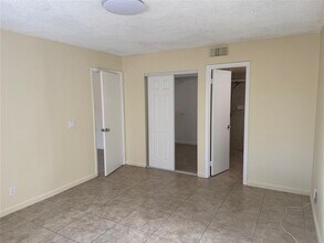 9001 Wiles Rd, Unit 204 in Coral Springs, FL - Building Photo - Building Photo