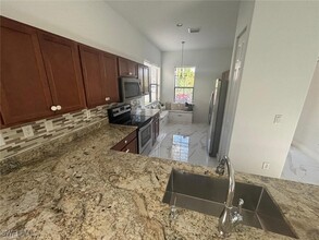 5458 Useppa Dr in Ave Maria, FL - Building Photo - Building Photo