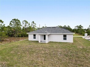 1076 Gunby Ave S in Lehigh Acres, FL - Building Photo - Building Photo