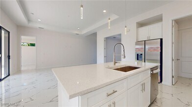 2310 NW 26th Pl in Cape Coral, FL - Building Photo - Building Photo