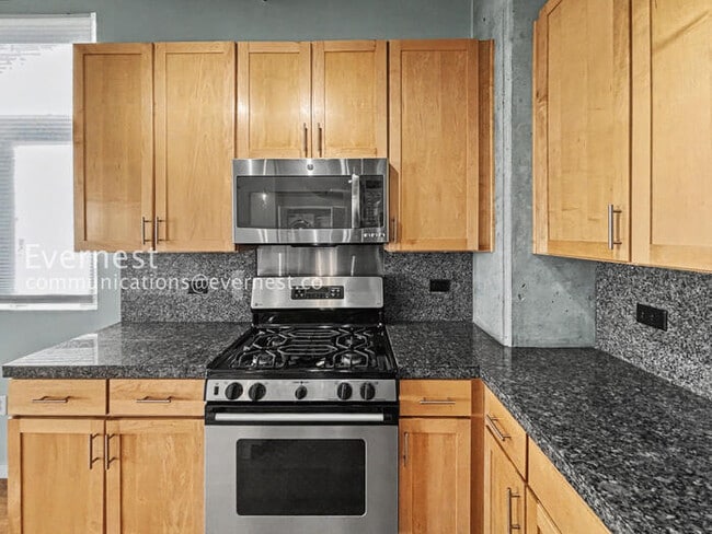 3201 Shoshone St, Unit UNIT 301 in Denver, CO - Foto de edificio - Building Photo