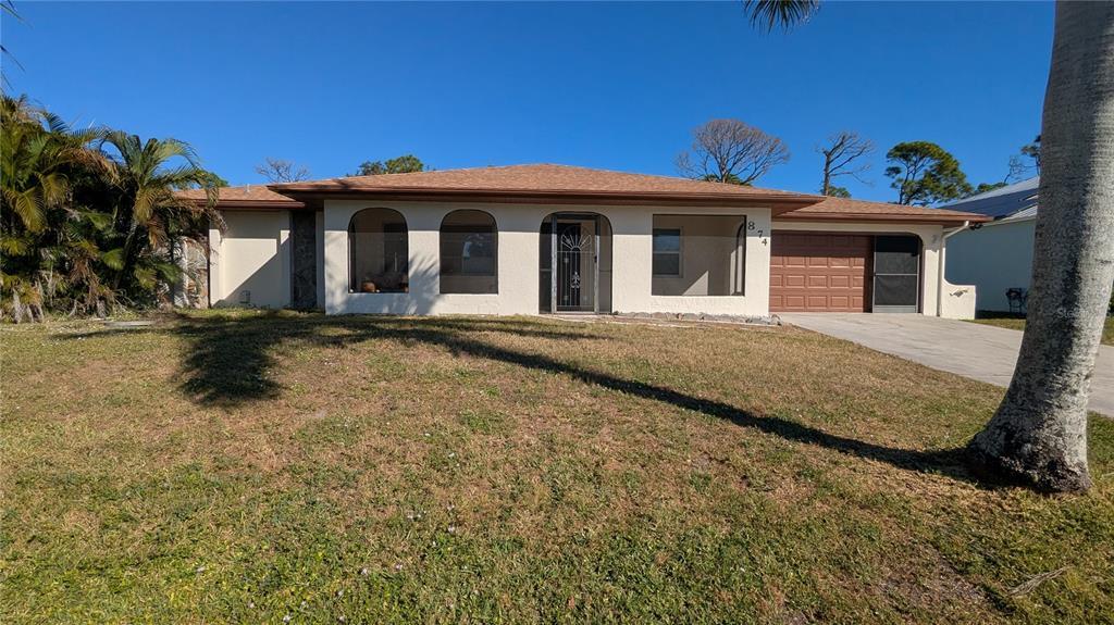 874 Dolphin Ave NW in Port Charlotte, FL - Building Photo