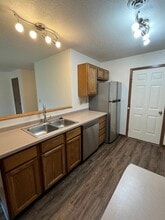 Courtyard Townhomes in Tomah, WI - Foto de edificio - Building Photo